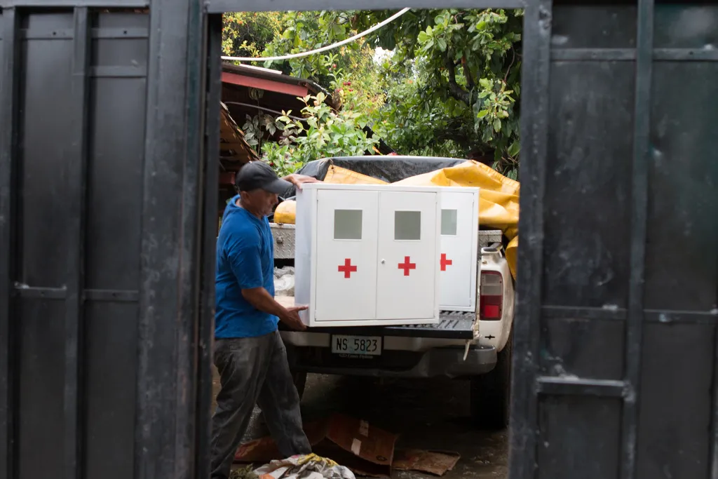 Medical equipment being unloaded from a vehicle